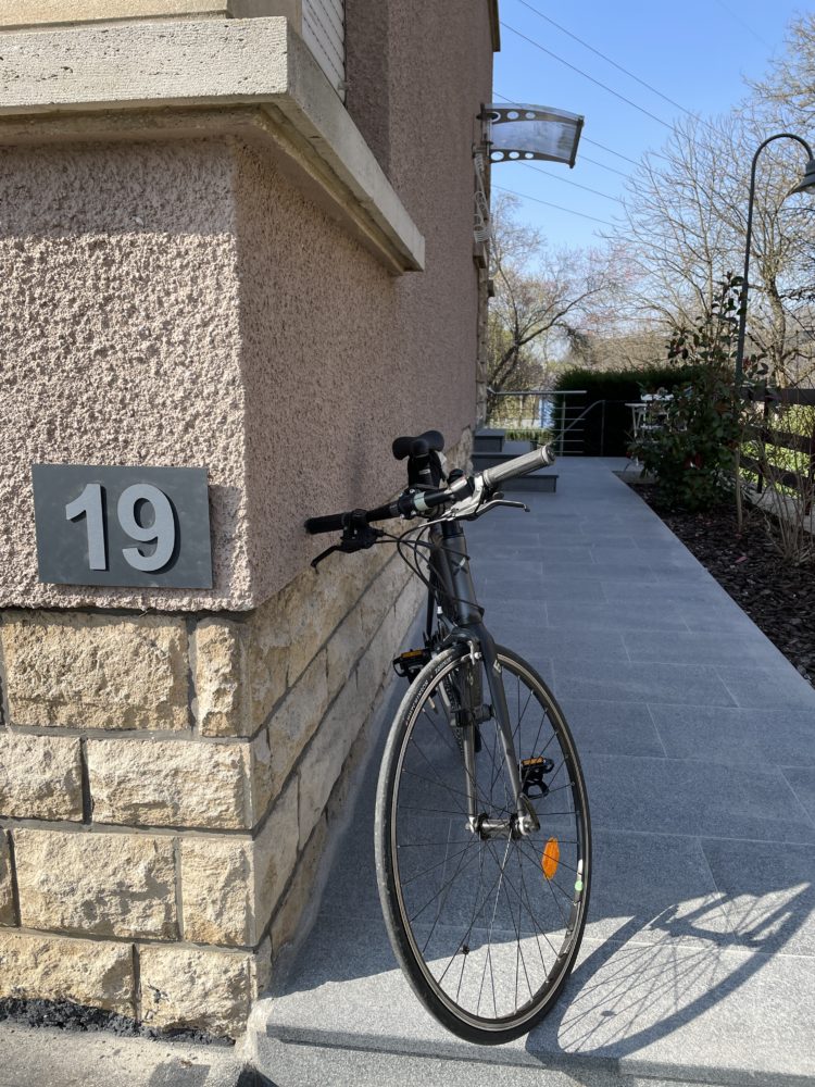 A lonely bike is waiting for spring