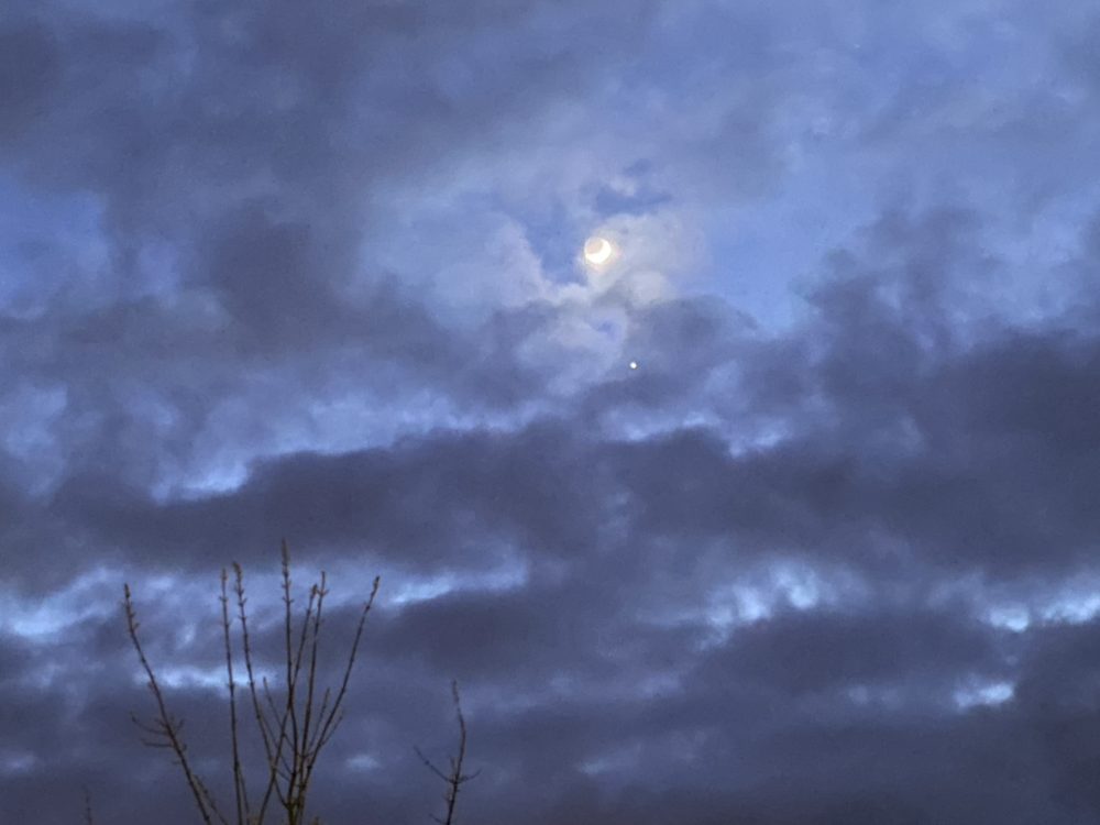 The Moon’s Beauty Shines Through the Clouds