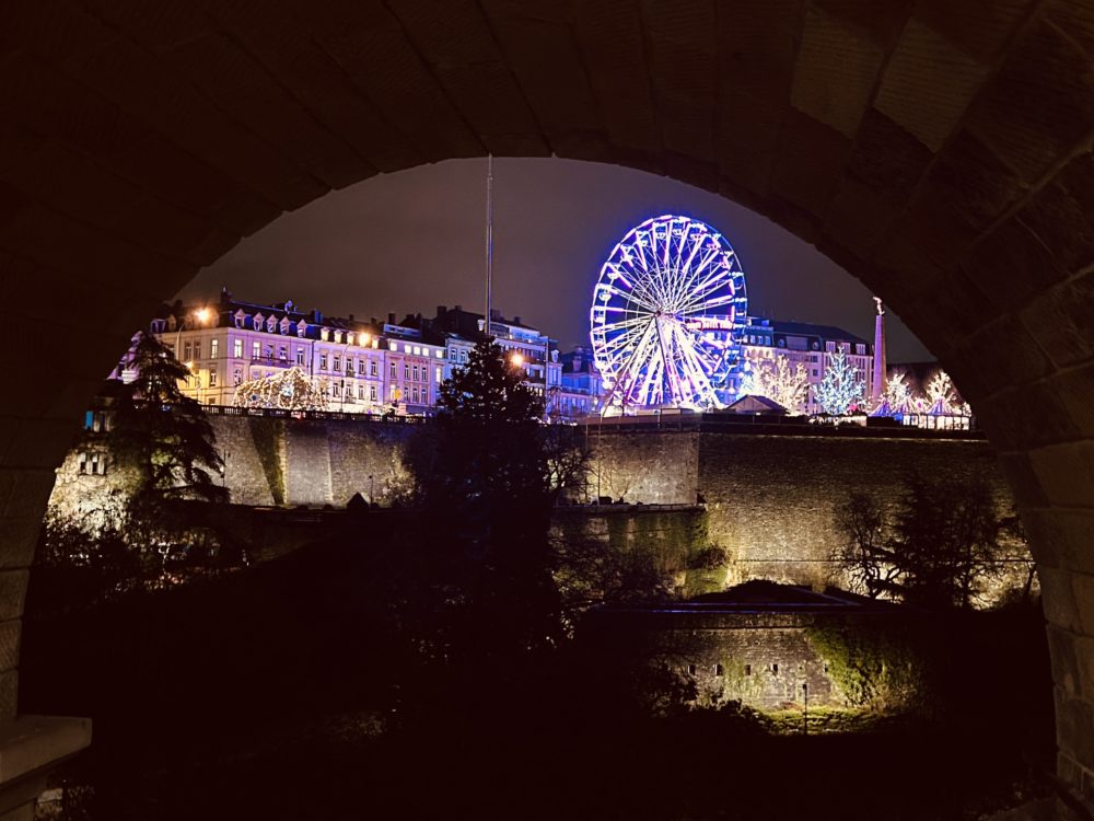 Walk or Cycle Under a Historic Bridge: The Pont Adolphe in Luxembourg