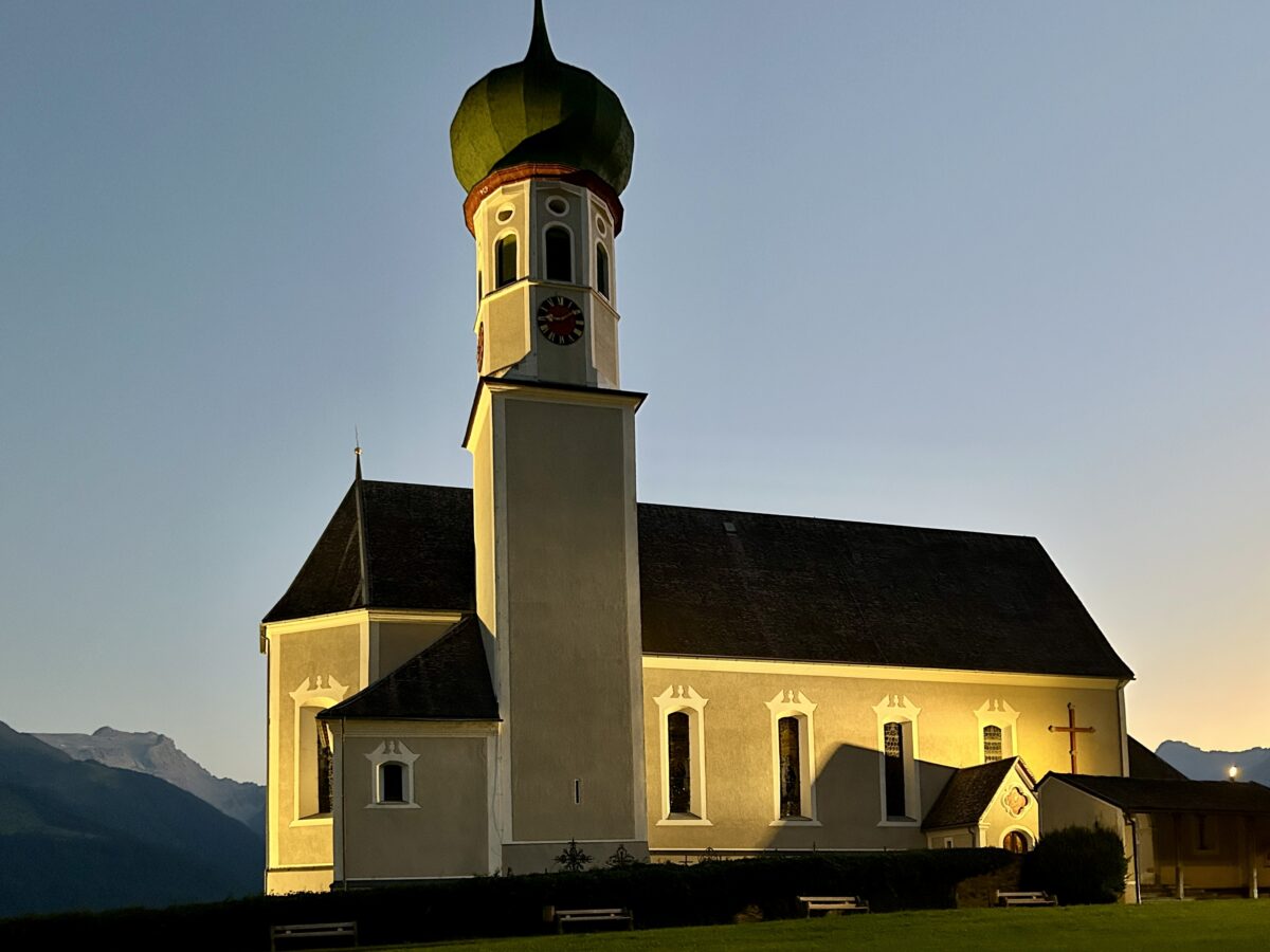 Glowing Grace: The Church of Bartholomäberg After Dark