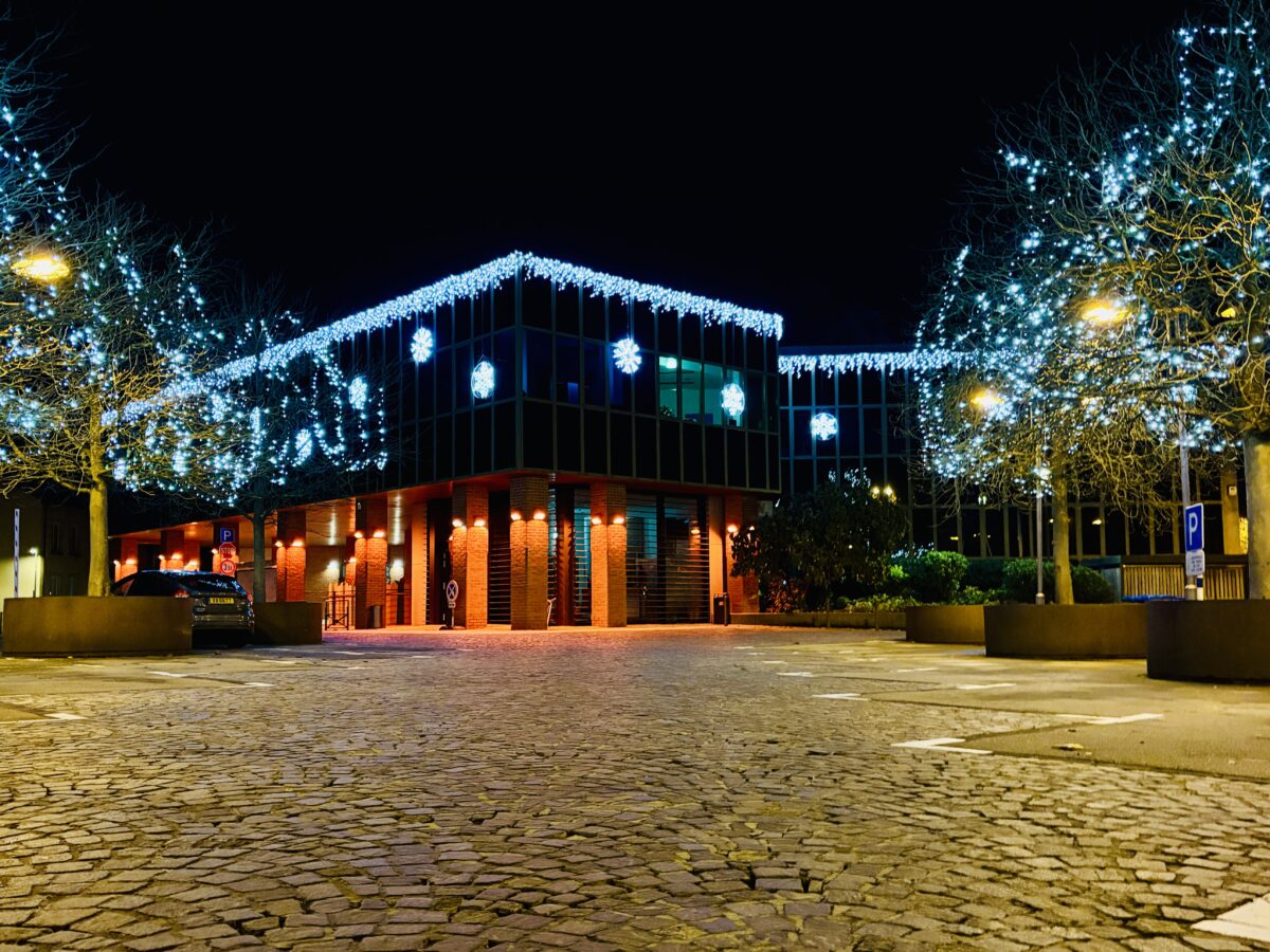 The Walferdange Townhall Glows in Orange and Christmas Lights