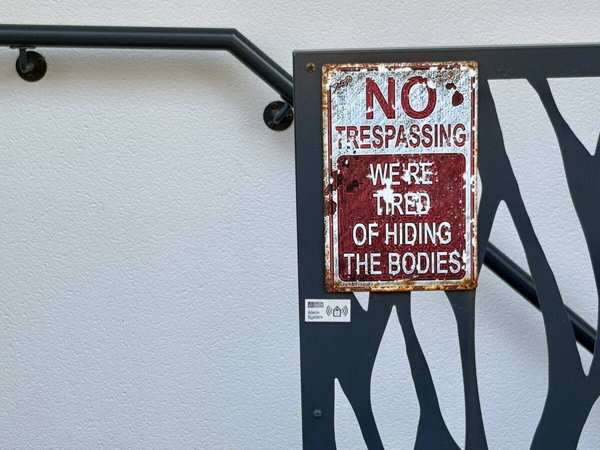 The fake dark humour of modern garden signs
