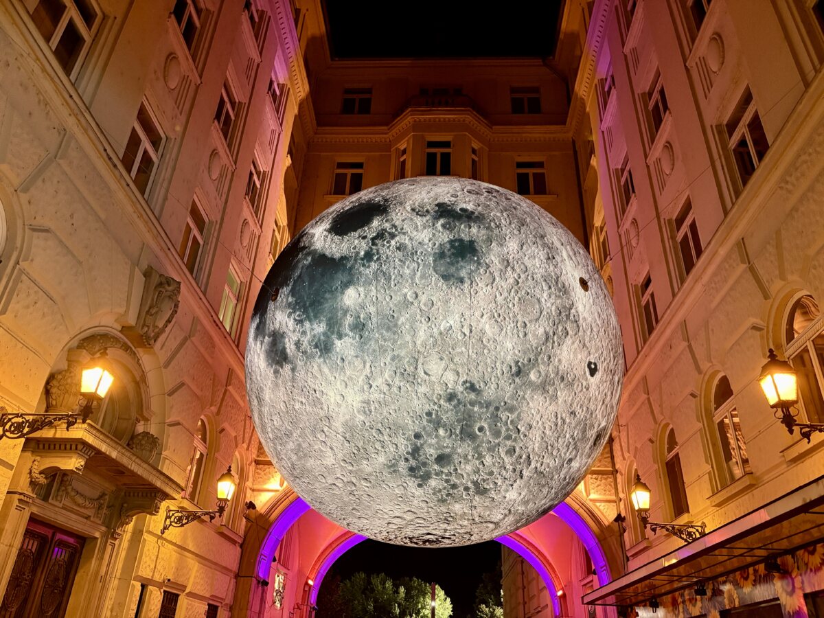 A giant floating Moon in Piarista köz: Budapest’s secret glowing alley